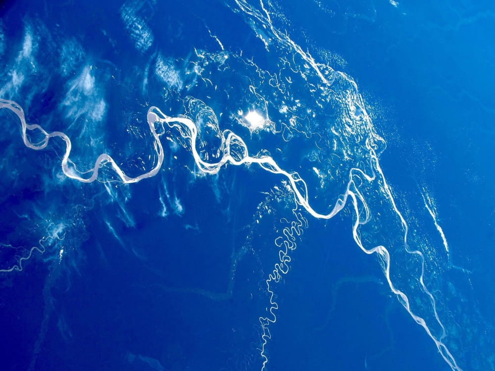 Satellite view from space showing the extensive winding path of the Amazon River. Satellite view from space showing the extensive winding path of the Amazon River.