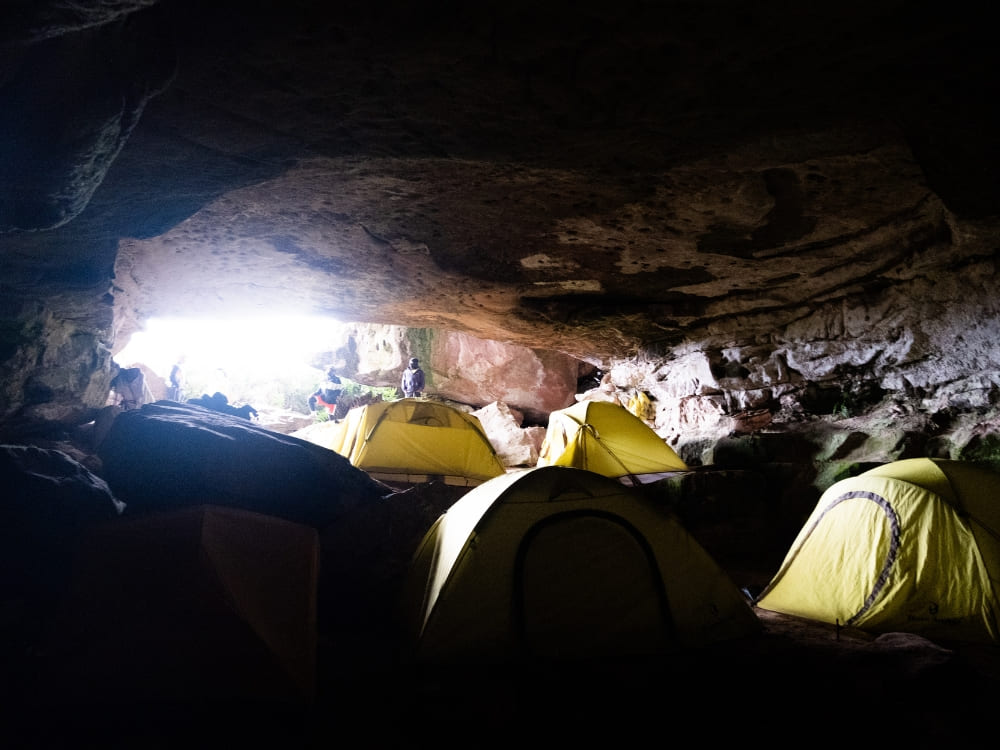 Tents set up in a rock shelter base camp on Mount Roraima